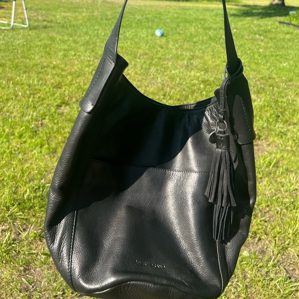 BRAND NEW NEVER USED~ Lucky genuine leather- Black Hobo style over the shoulder